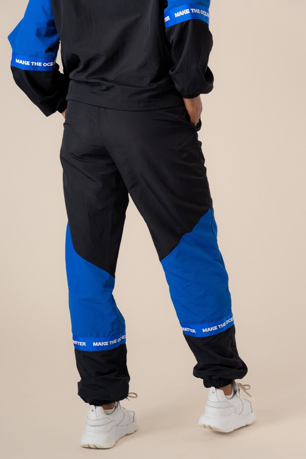 Adventure tracksuit pants - Nero/Cartel Blue